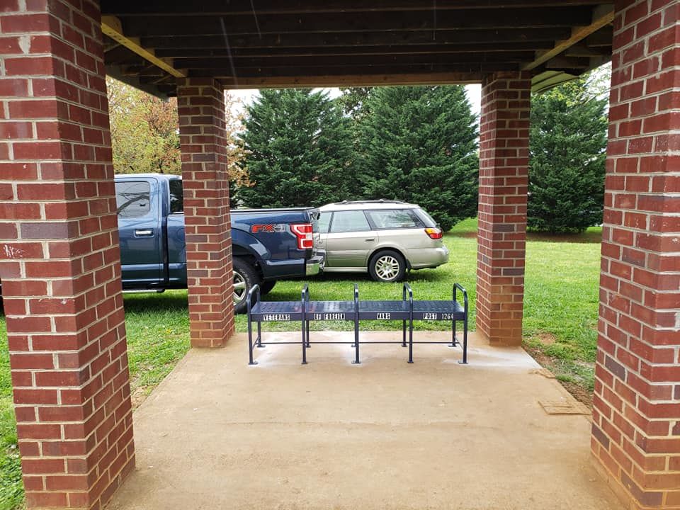 It took awhile to locate a Bench and it had to be painted but its finally finished. A special thanks goes to Randy for helping to locate and painting it and Chris for installing it. Several other people were actively involved and thanks to all.
